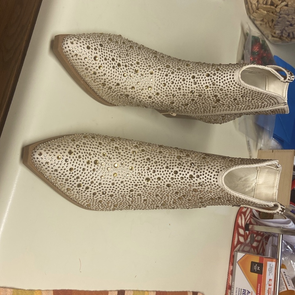 Size 10 gold boots with crystals. Never been worn due to arthritic ankles.